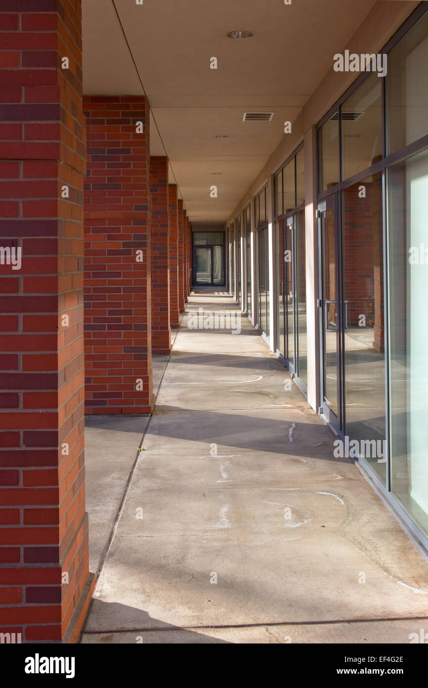 Building pillars outside corridor and glass doors Stock Photo Alamy