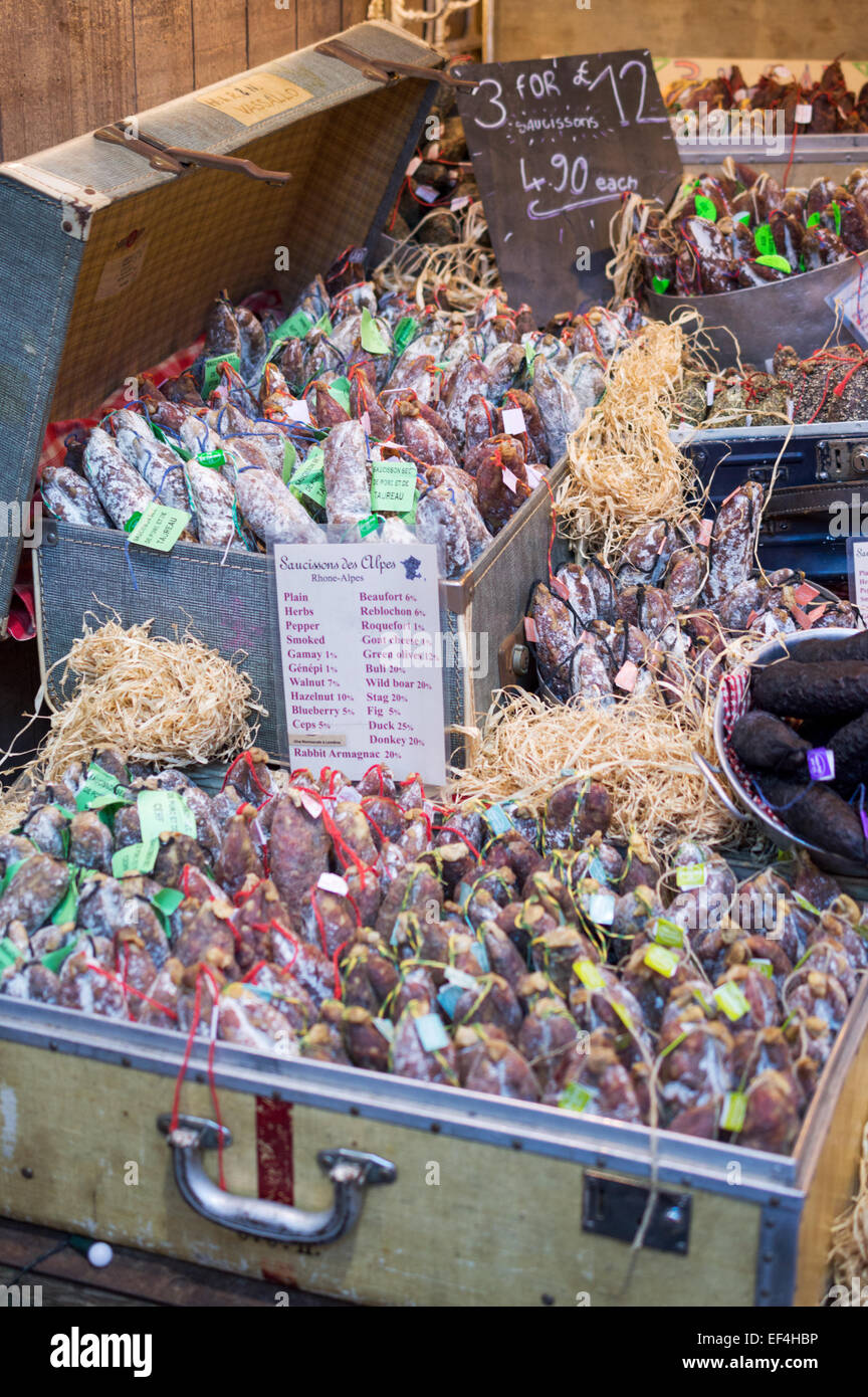 Rustic display of artisan produced saucissons on a stall at London's Borough Market Stock Photo