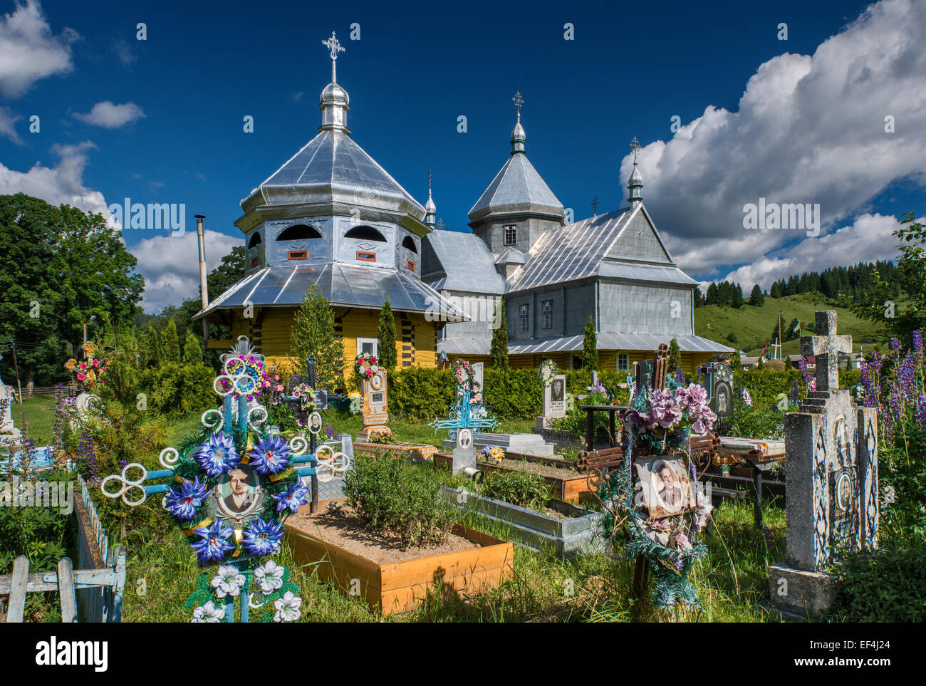 Cemetery at Greek Catholic Church in village of Iltsi near Verkhovyna, Hutsul Region, Pokuttya, Prykarpattia Region, Ukraine Stock Photo