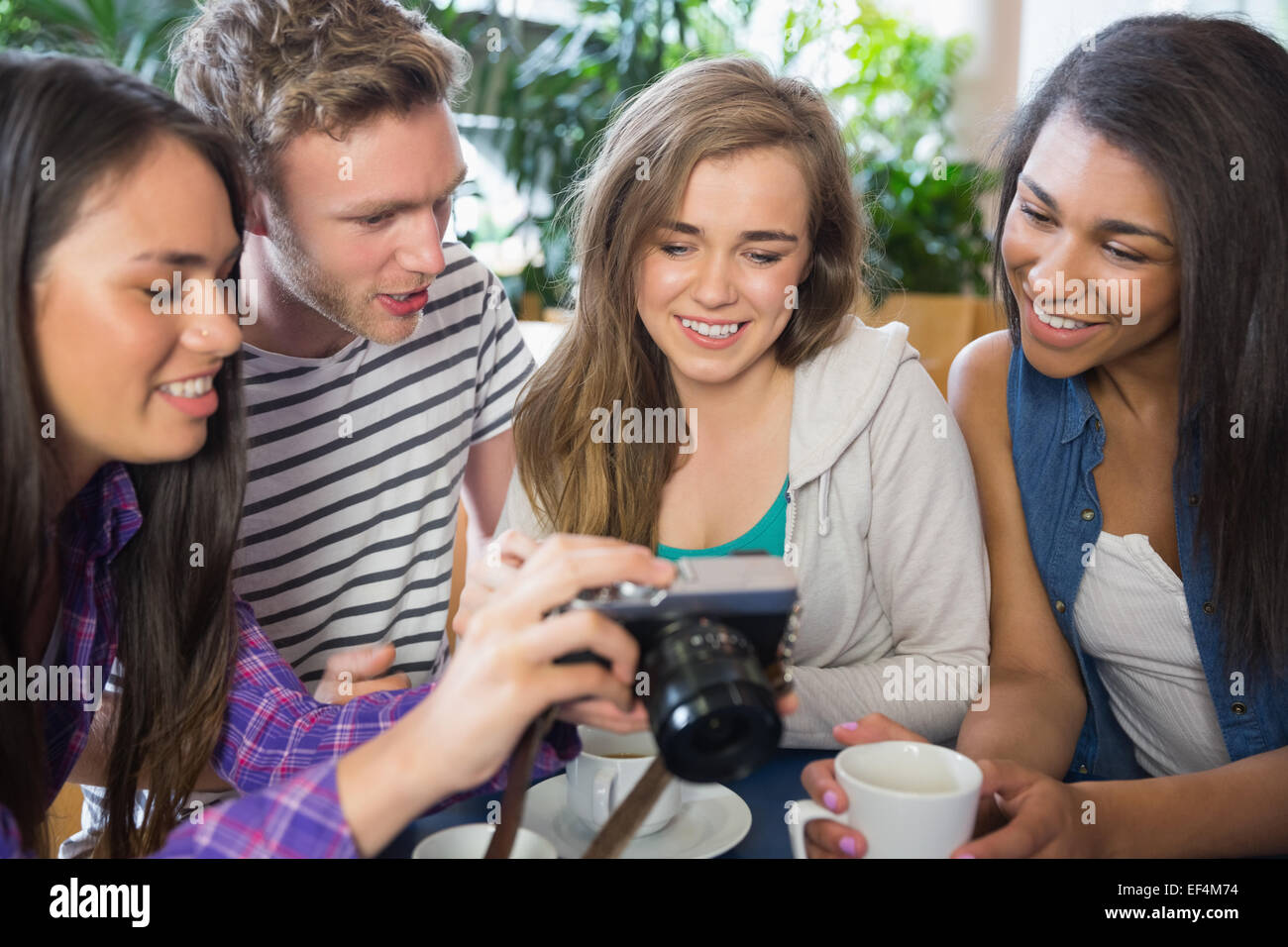 Young students looking at a camera Stock Photo - Alamy
