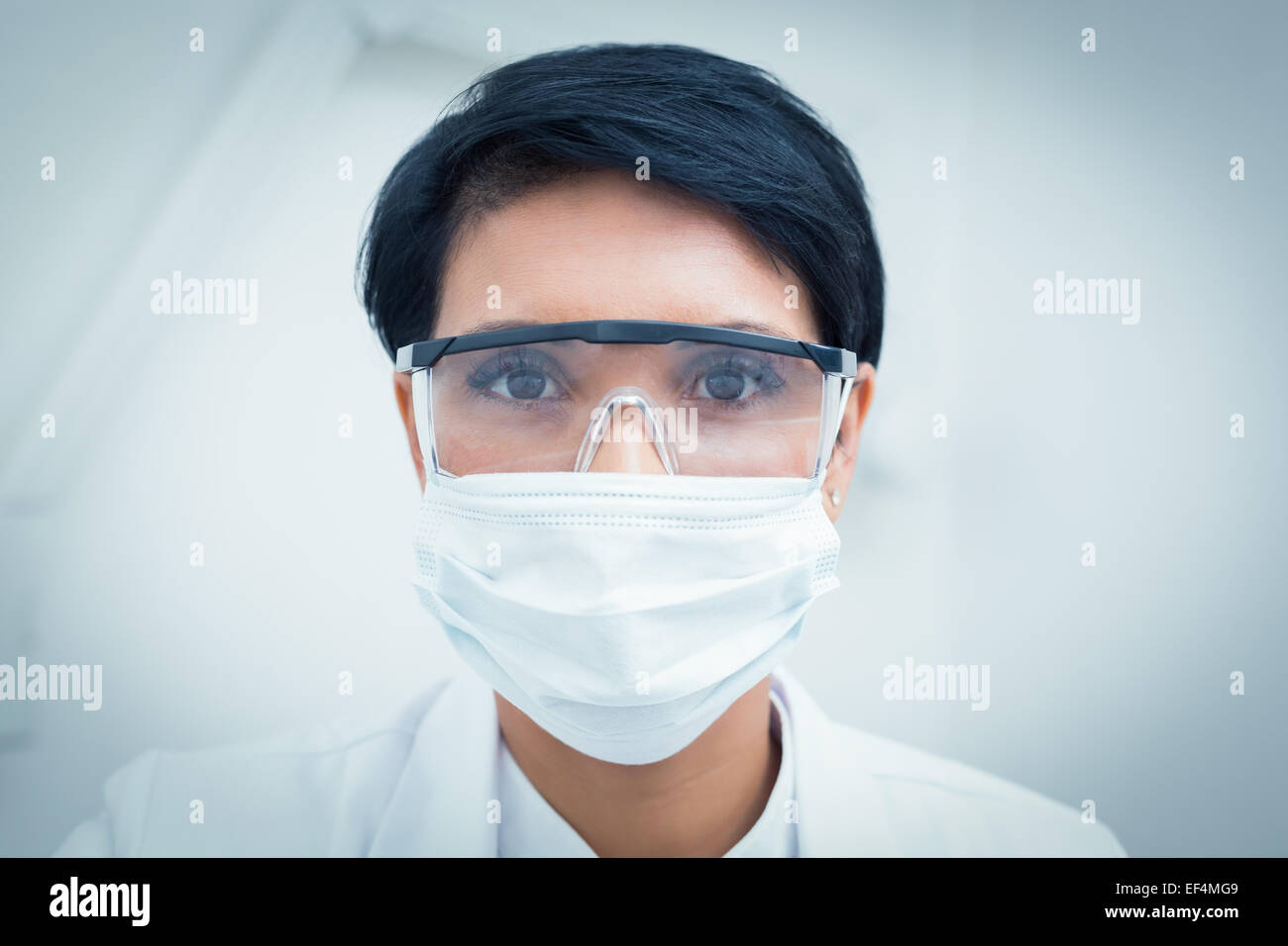 Female dentist wearing face mask hires stock photography and images