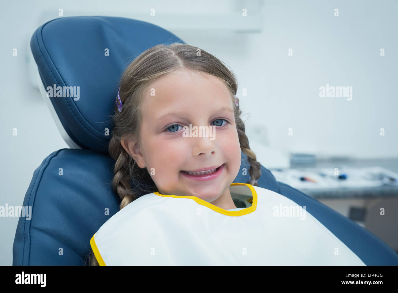 Smiling girl waiting for dental exam Stock Photo