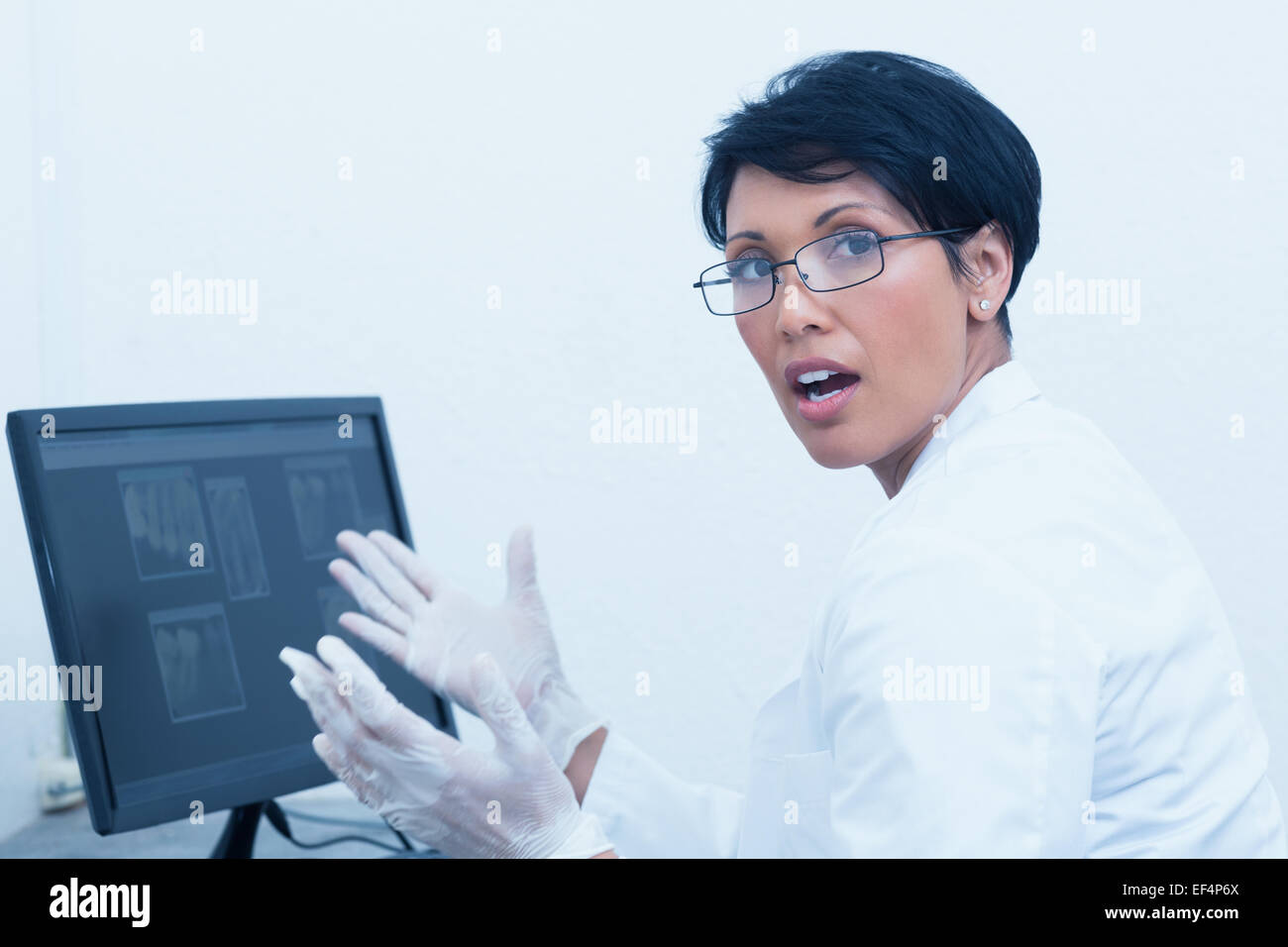 Female dentist with xray on computer Stock Photo Alamy