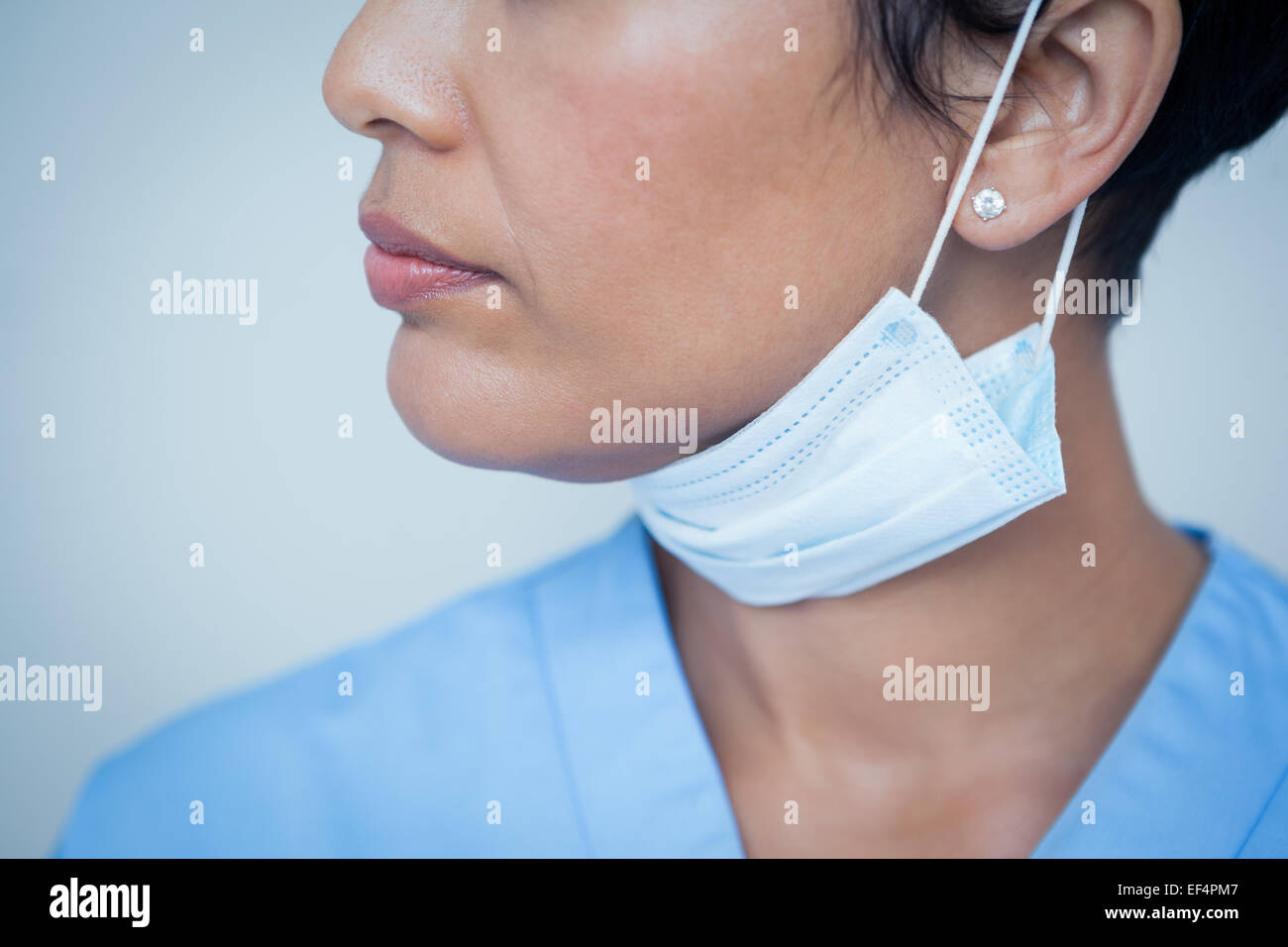 Female dentist wearing surgical mask Stock Photo Alamy