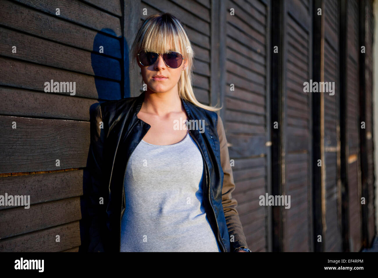 Portrait of young woman with sunglasses Stock Photo