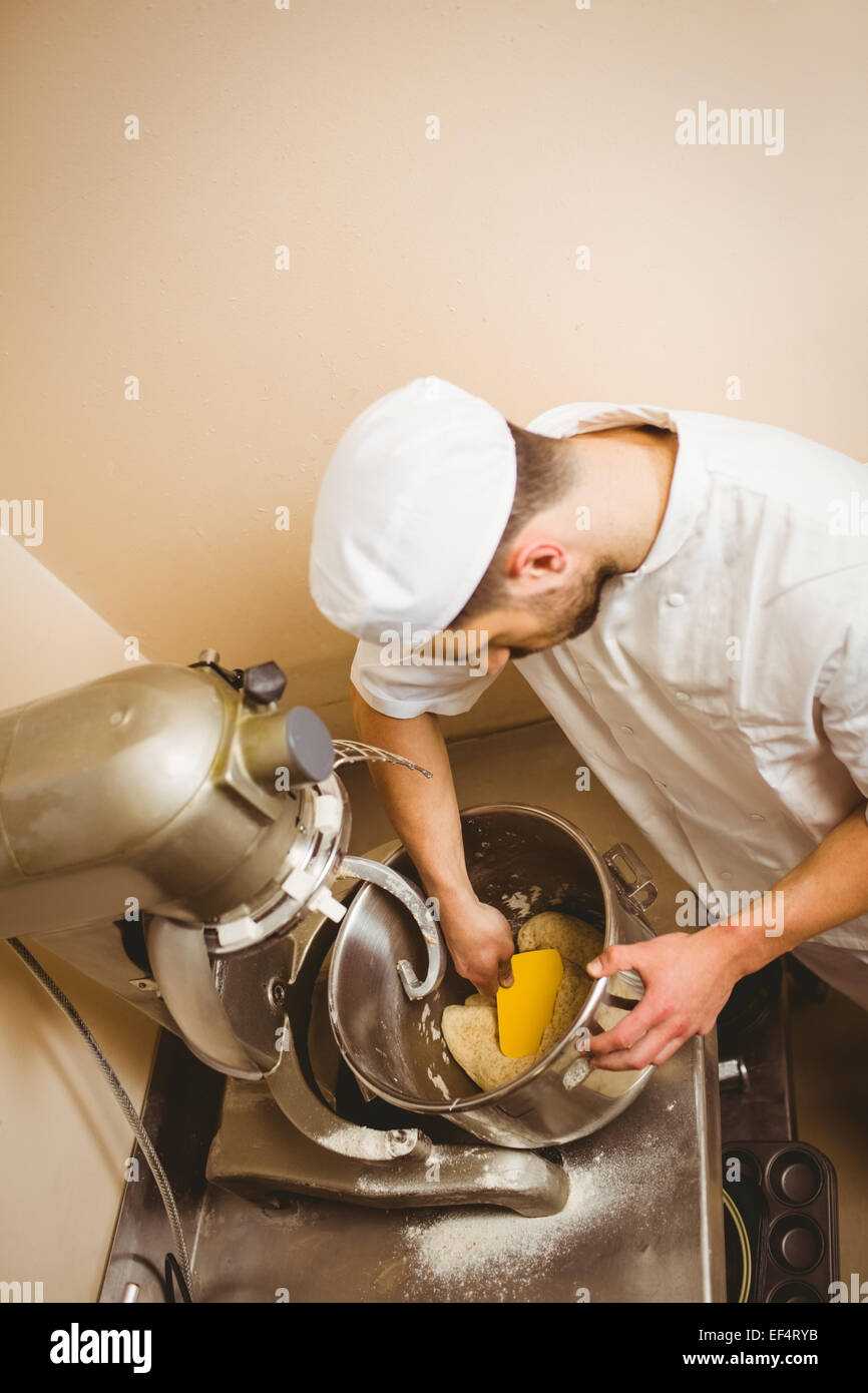 Bread Mixer In Bakery, mixing dough for baguettes in a bakery machine for  mixing dough Stock Photo - Alamy