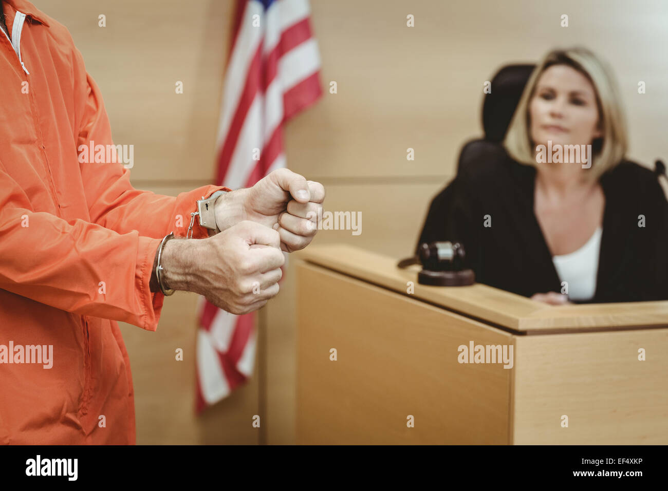 Close up of a prisoner wearing handcuffs Stock Photo