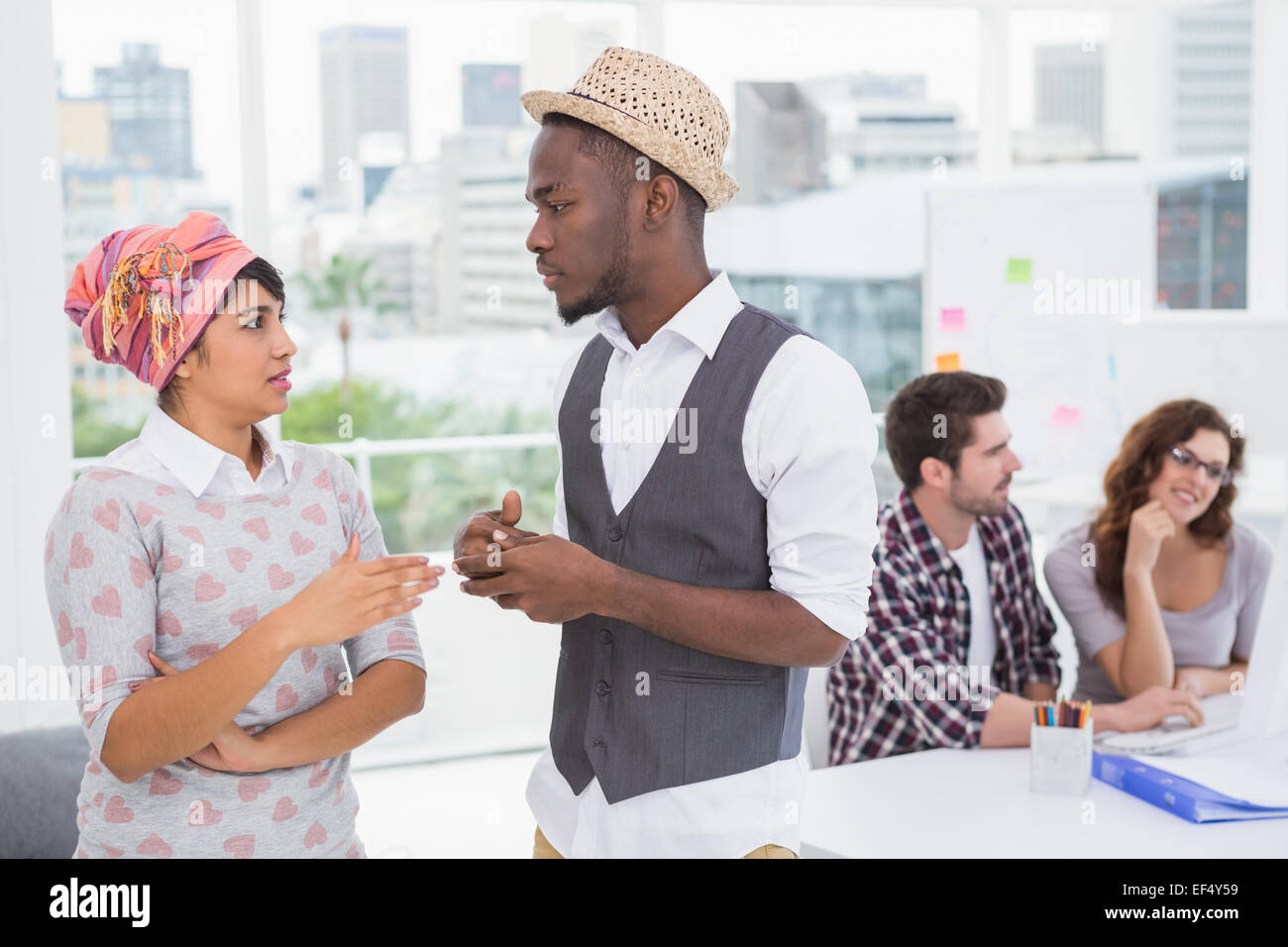 Standing coworkers in business hi-res stock photography and images - Alamy