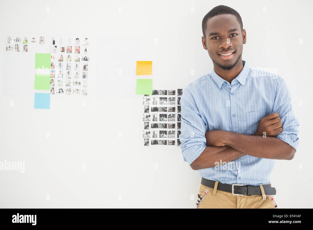 Portrait of smiling businessman with arms crossed Stock Photo - Alamy