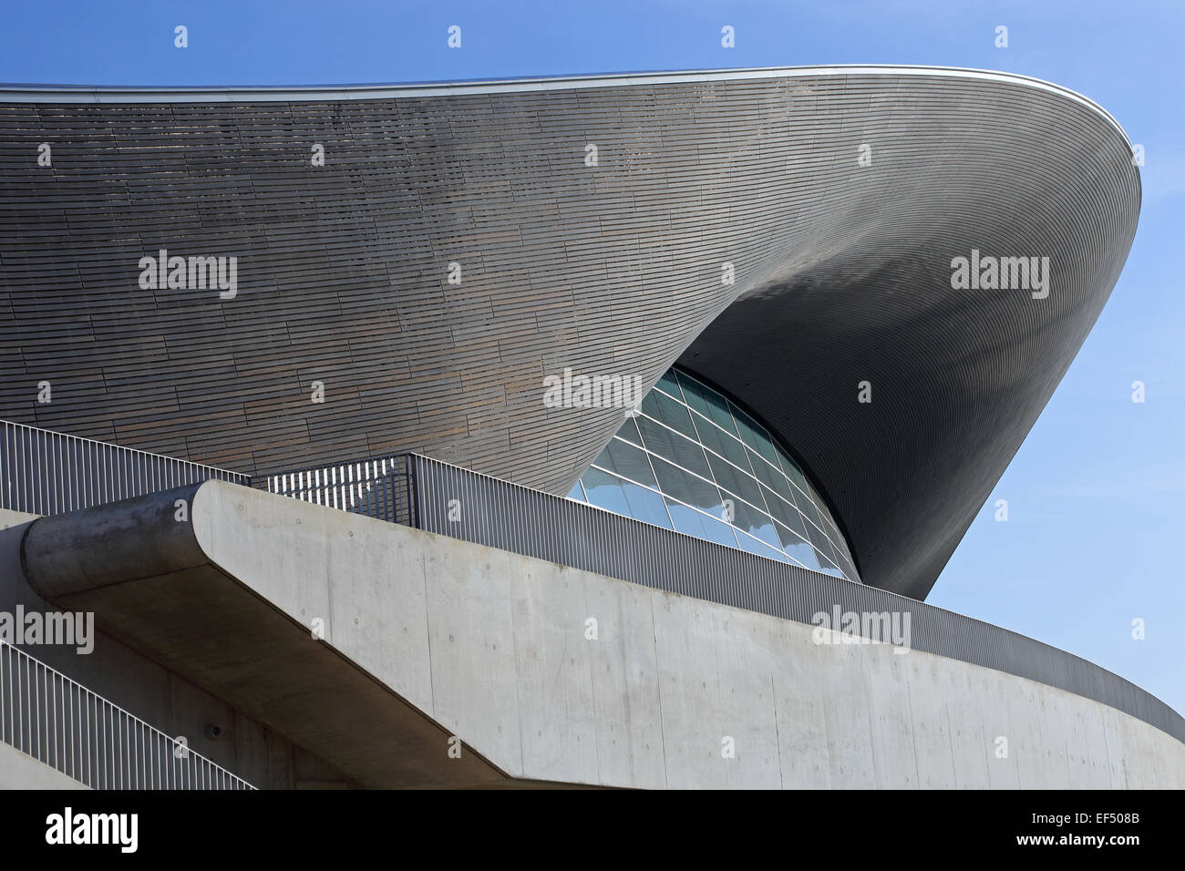 London Olympic Aquatic centre designed by Zaha Hadid showing roof structure and glazing. Temporary seating wings removed. Stock Photo