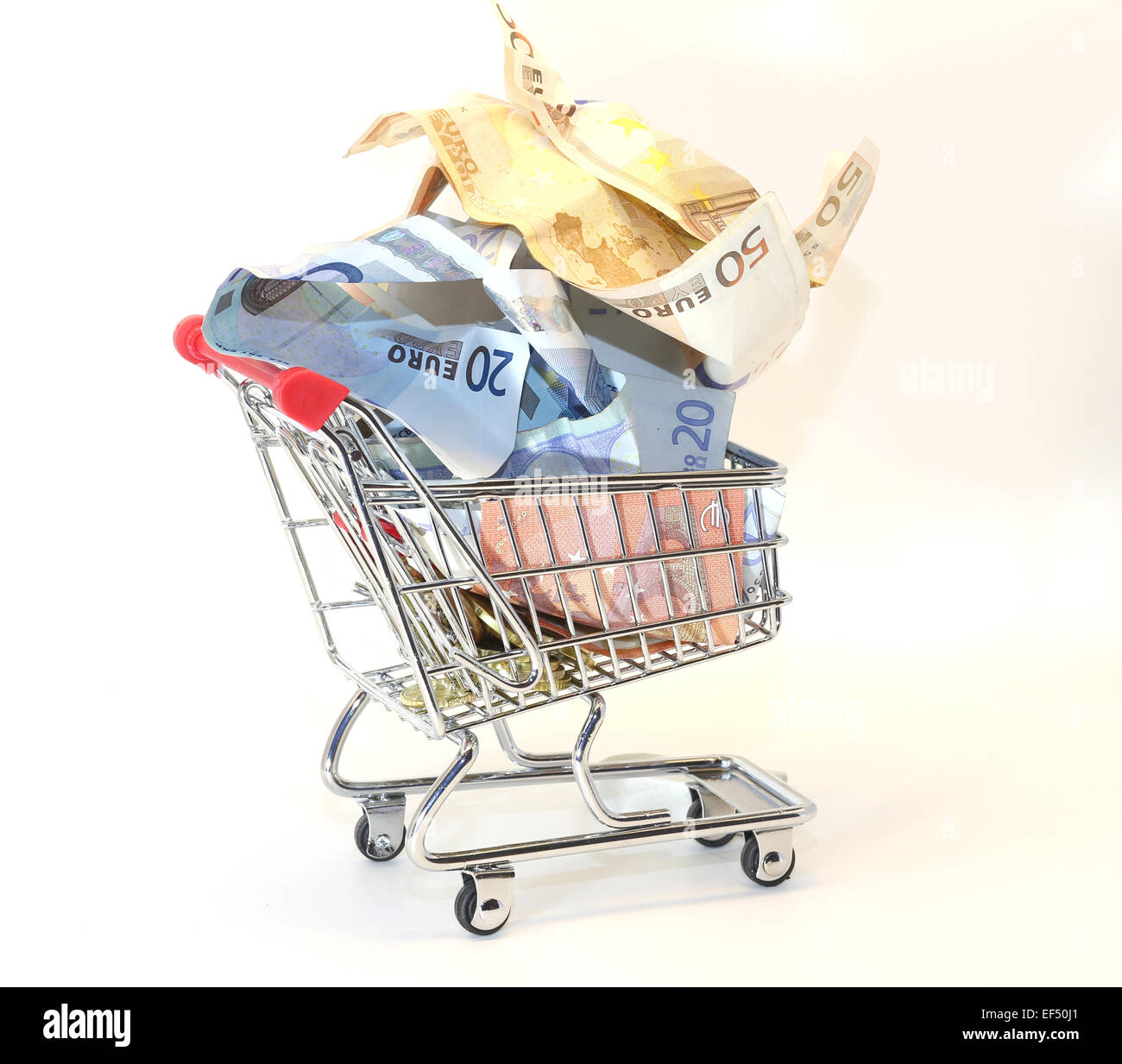 european shopping cart full of crumpled euro banknotes Stock Photo Alamy