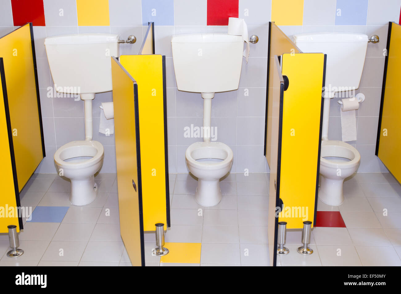 small bathroom of a school for children with water closed Stock Photo