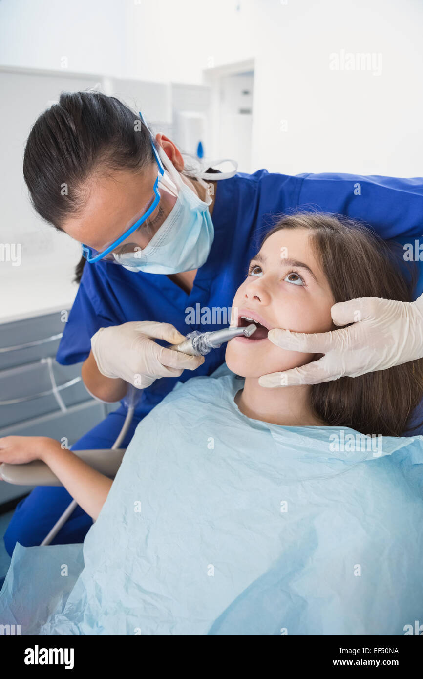 Pediatric dentist wearing safety glasses Stock Photo Alamy