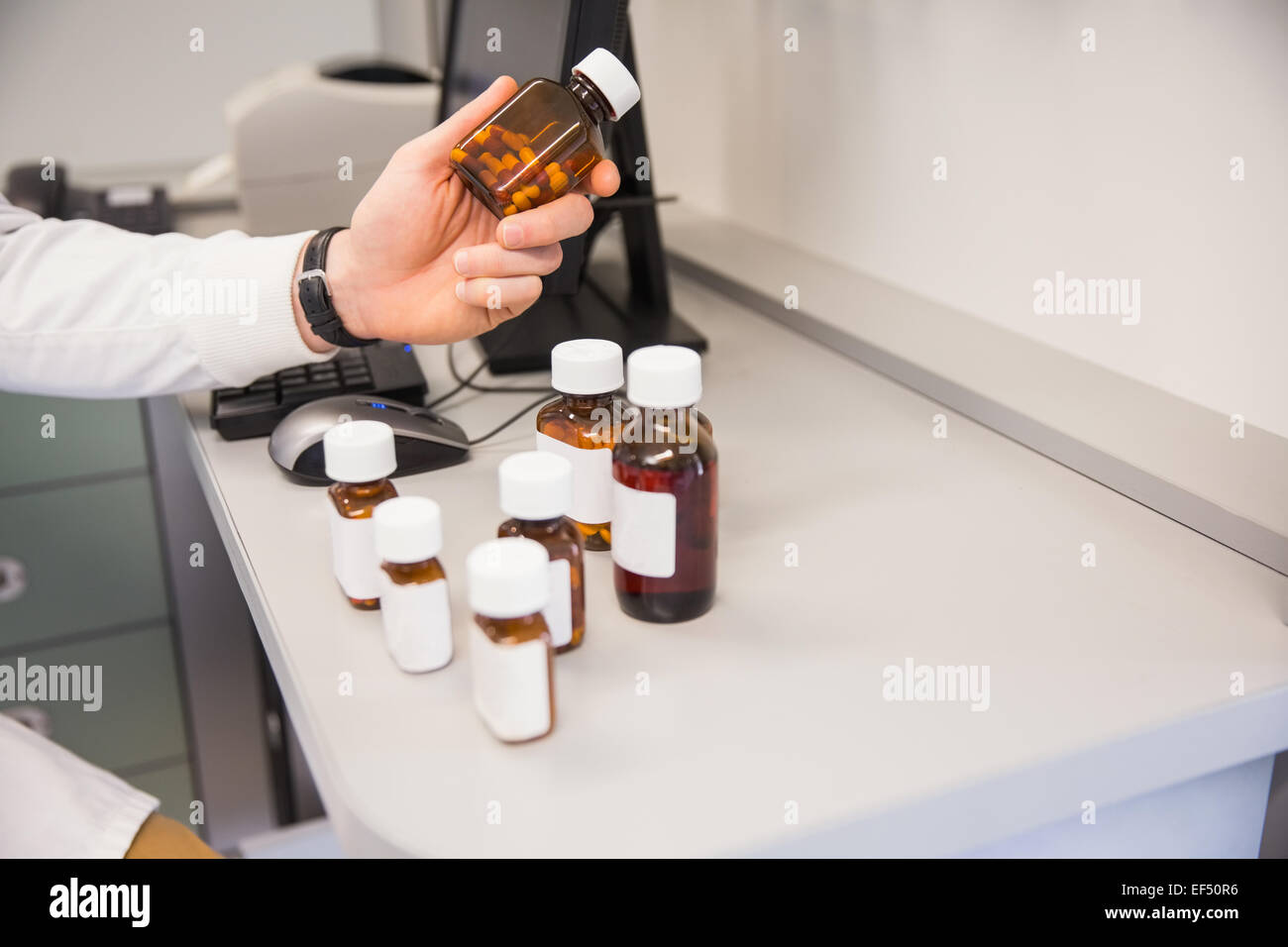 Pharmacist at her desk hi-res stock photography and images - Alamy