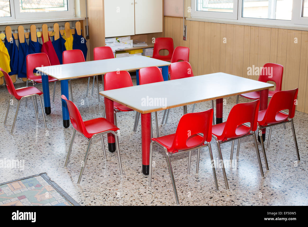 classroom nursery with small chairs and small desks for children Stock Photo