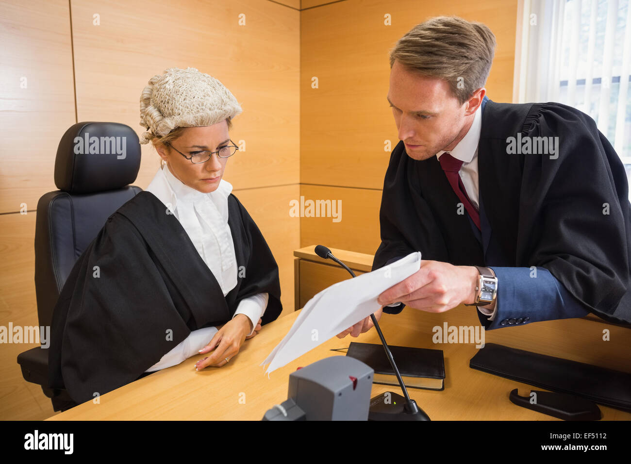 Lawyer speaking with the judge Stock Photo