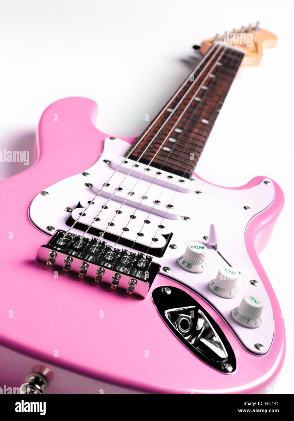 Powder Pink female electric rock guitar performance, close up breaktime Stock Photo