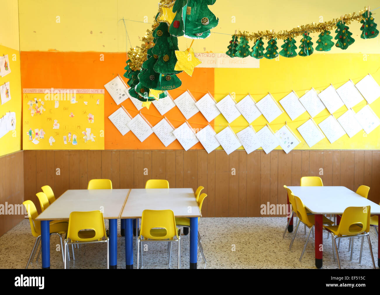 Kindergarten Classroom With Yellow Chairs And Table With