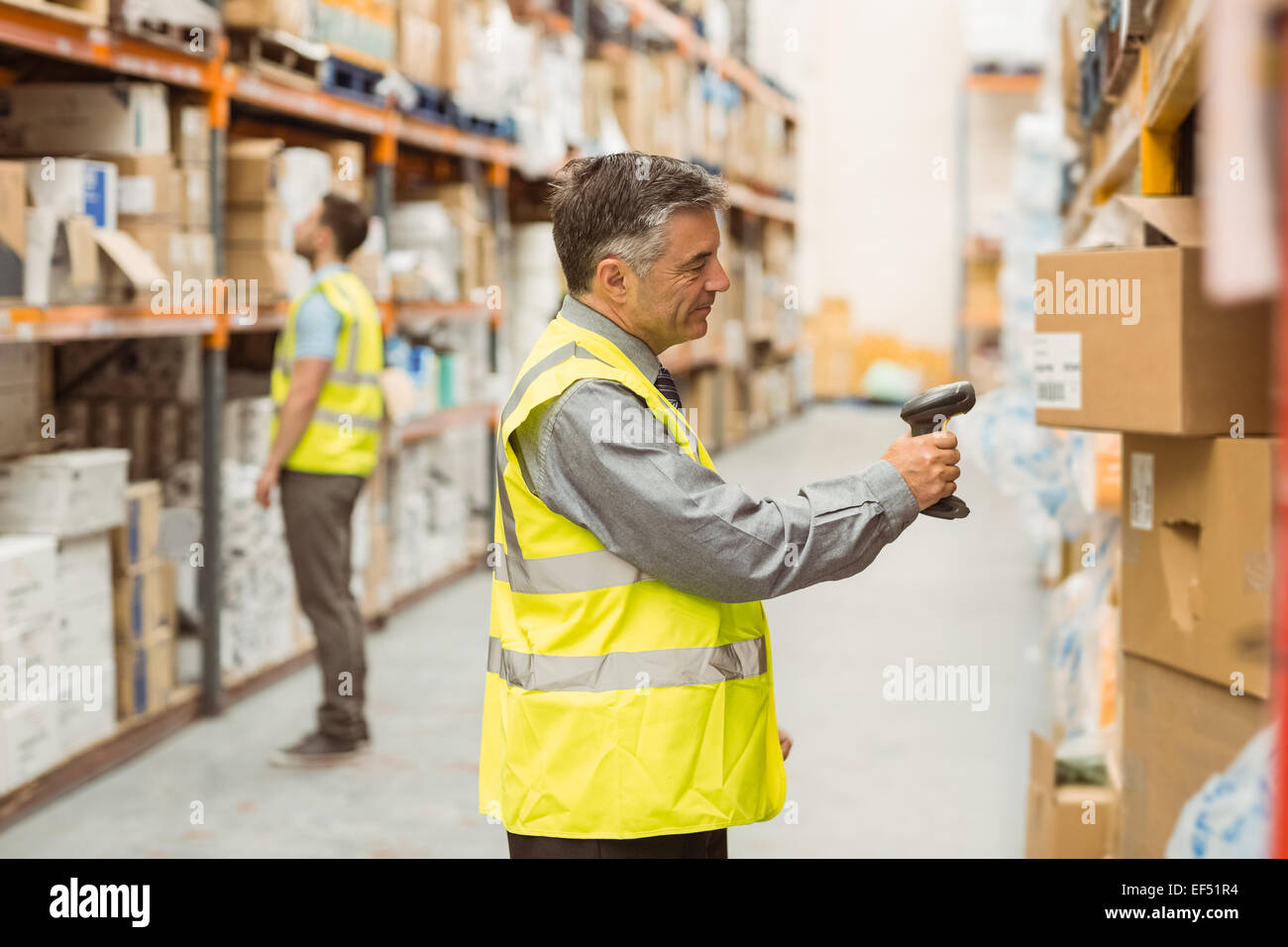 Warehouse scanning barcode on box hi-res stock photography and images ...