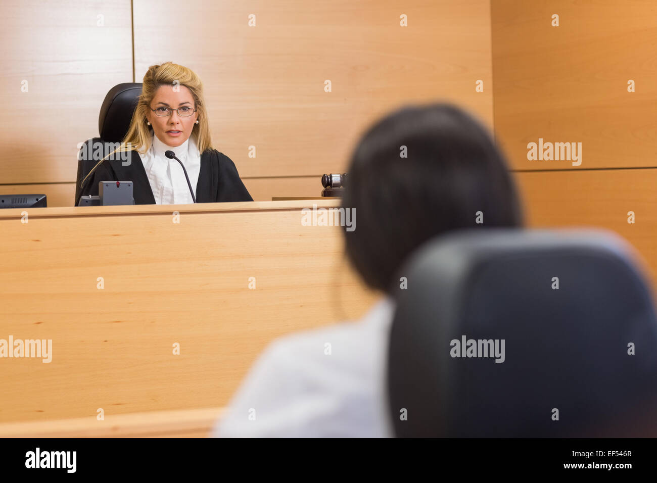 Lawyer listening to the judge Stock Photo