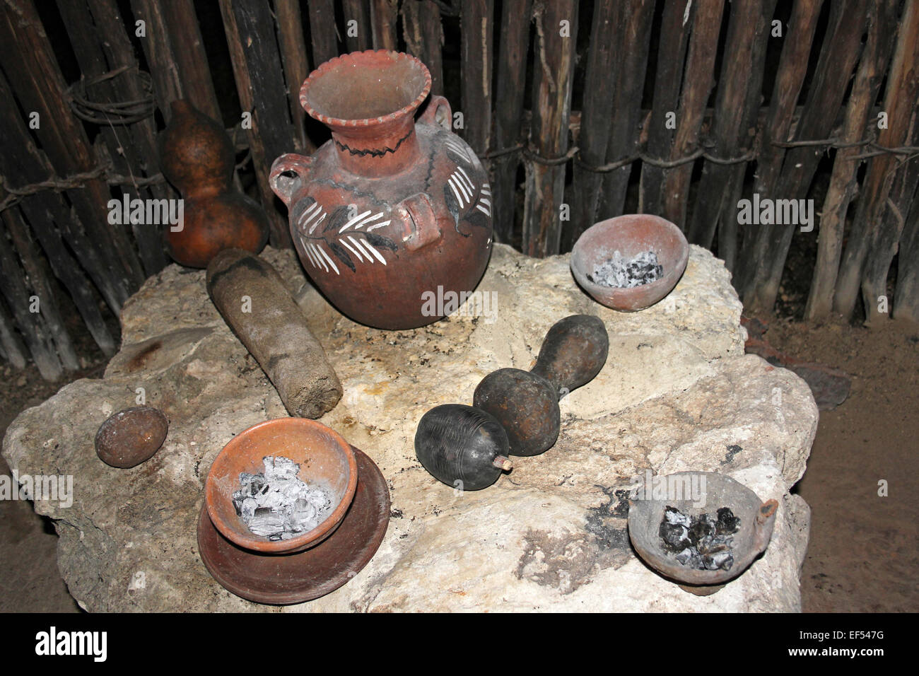Mayan Pots, Gourds And Incense Burners In The Traditional Maya House At Belize Botanic Gardens Stock Photo
