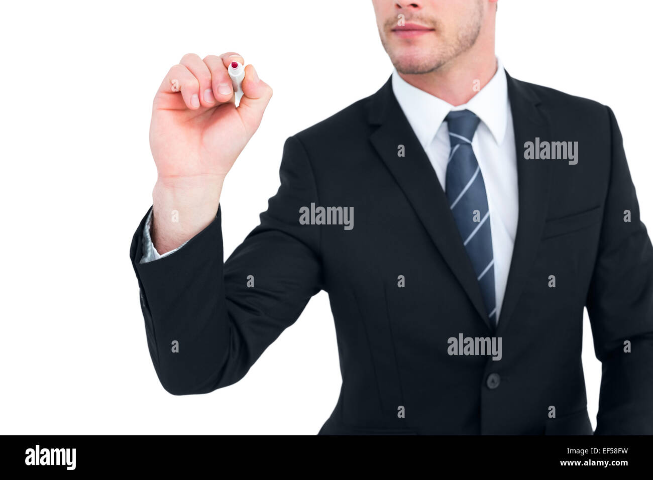 Businessman writing with a marker Stock Photo - Alamy