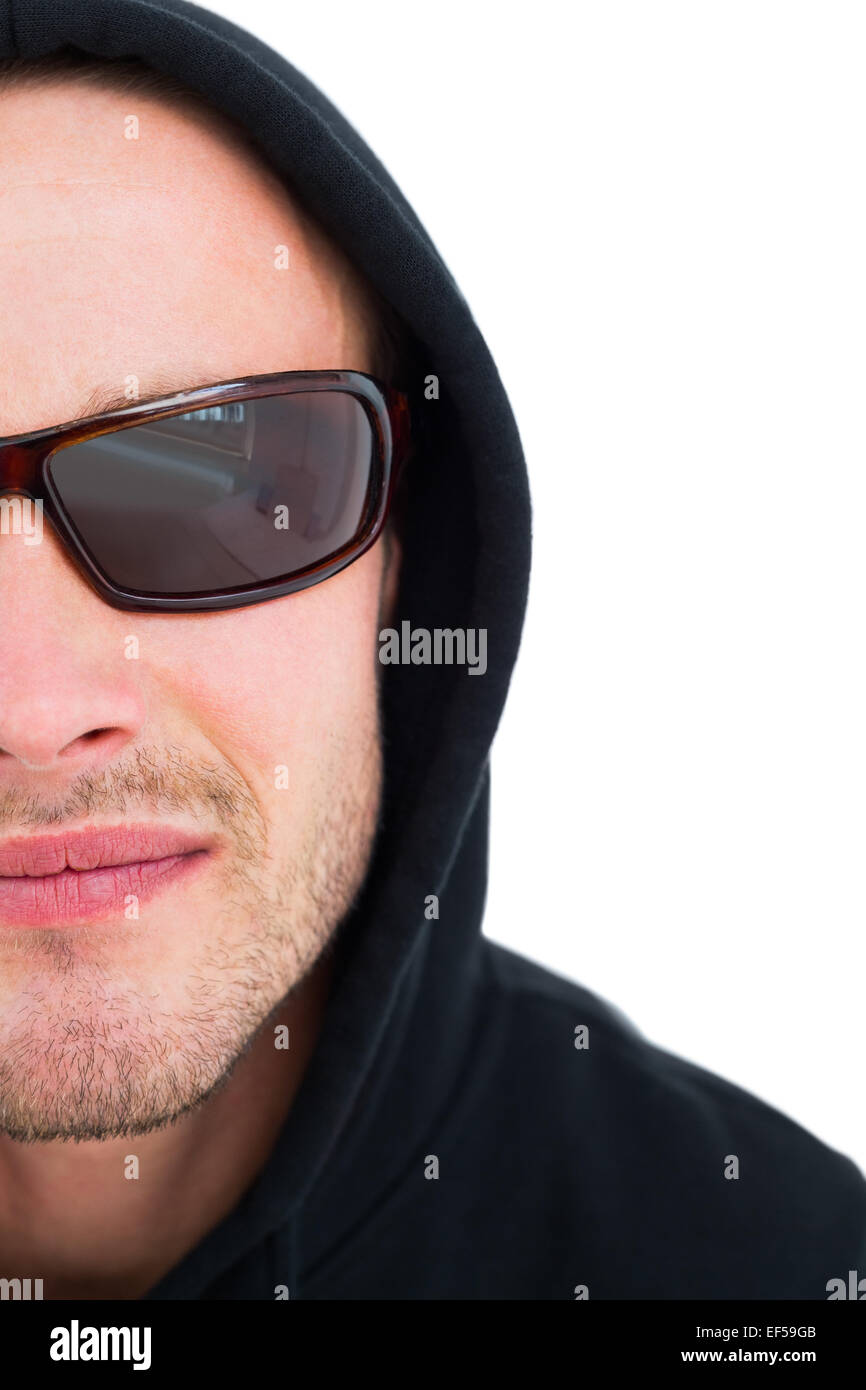 Portrait of hacker in hood with sunglasses Stock Photo - Alamy