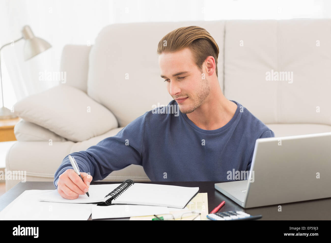 Concentrate man counting his bills Stock Photo