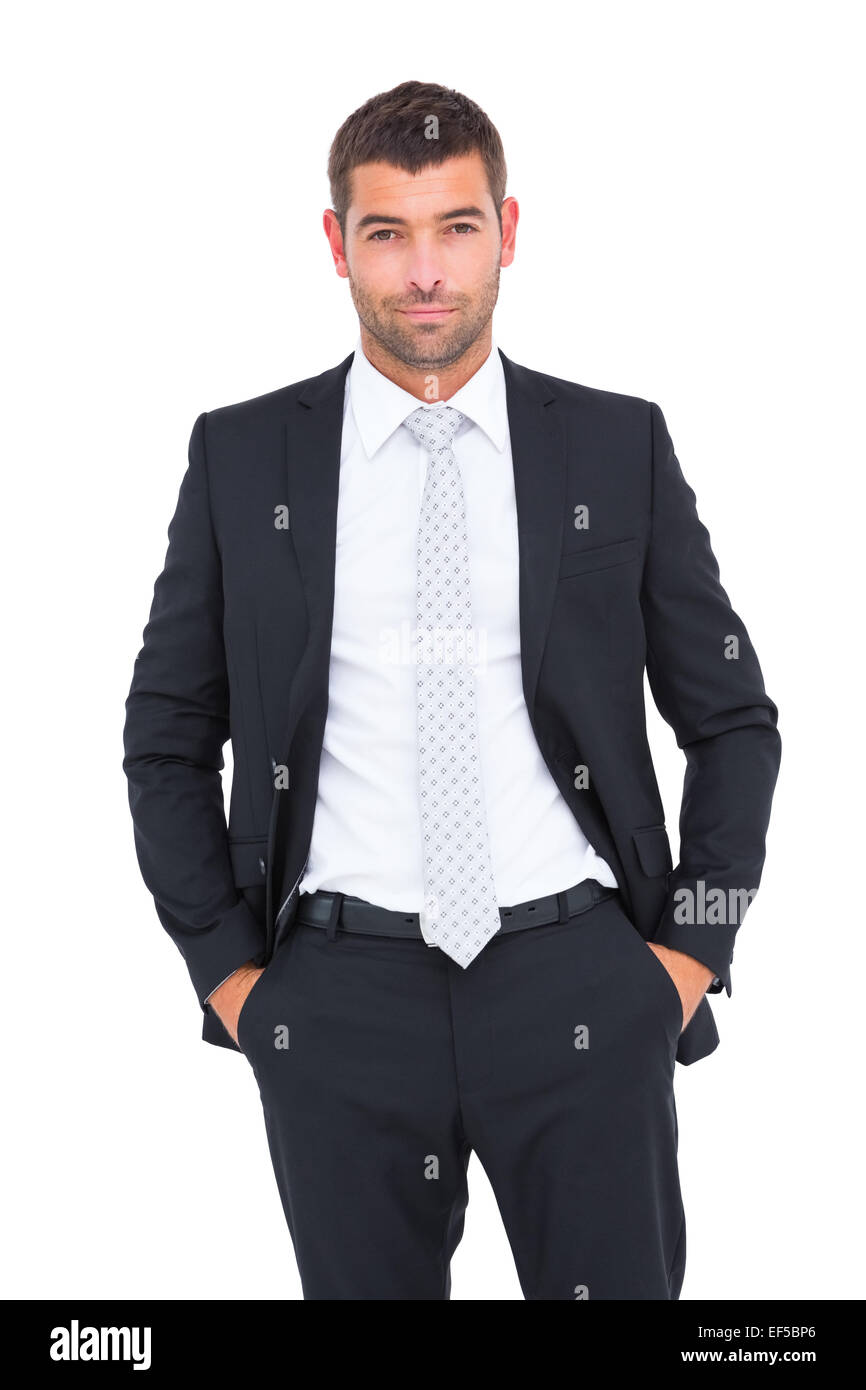 Smiling businessman looking at camera Stock Photo - Alamy