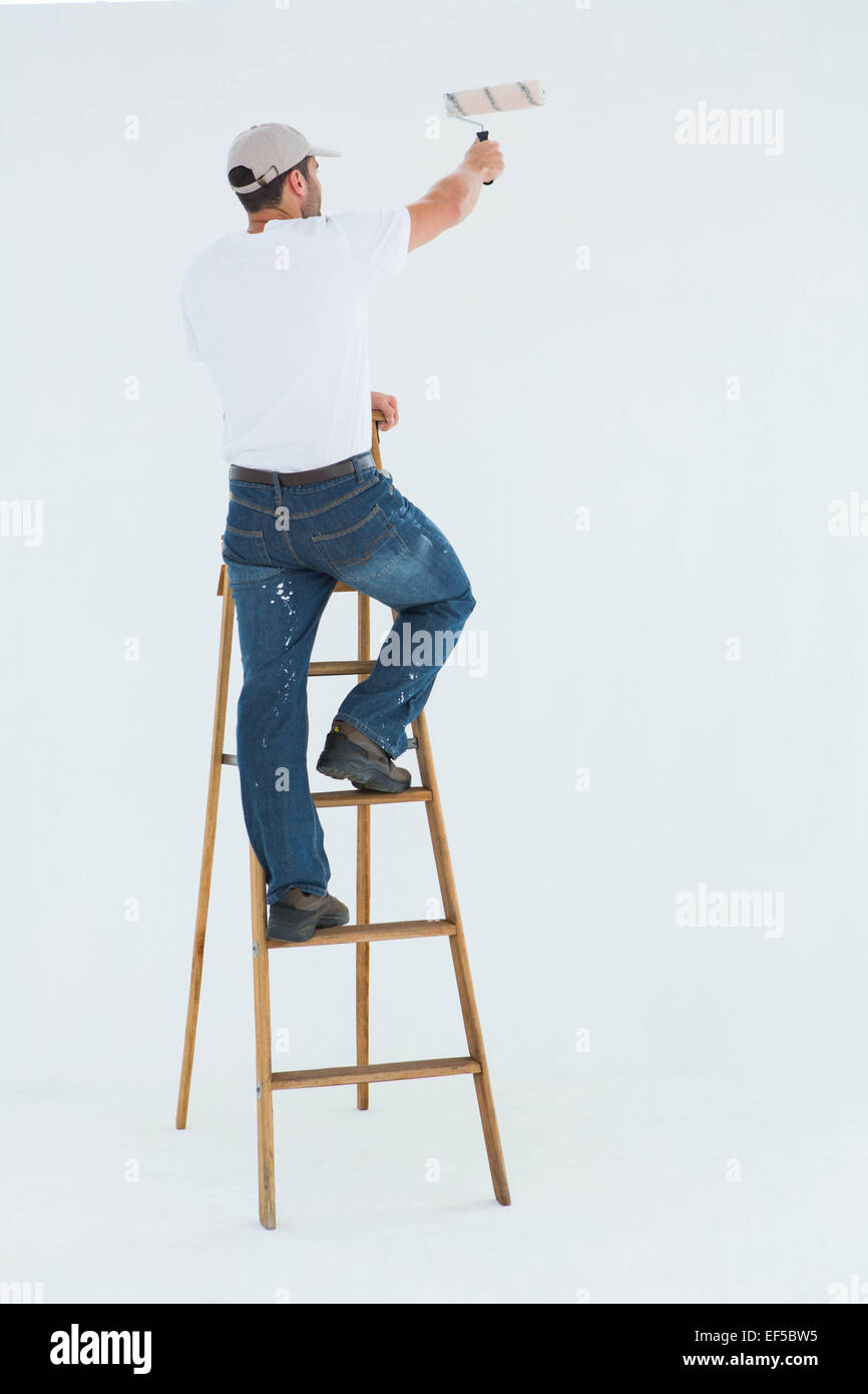 Man on ladder painting hires stock photography and images Alamy