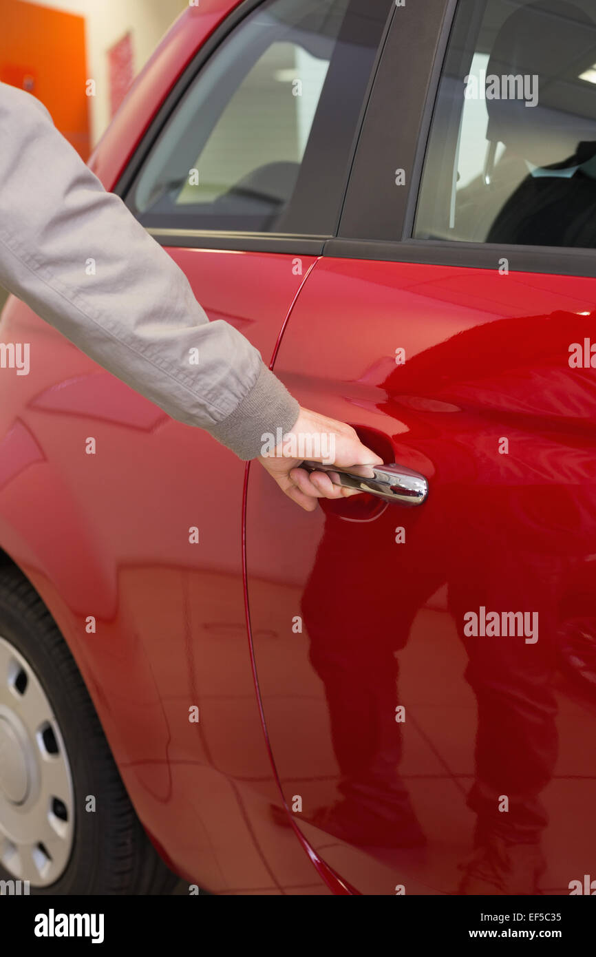 Man holding a car door handles Stock Photo Alamy