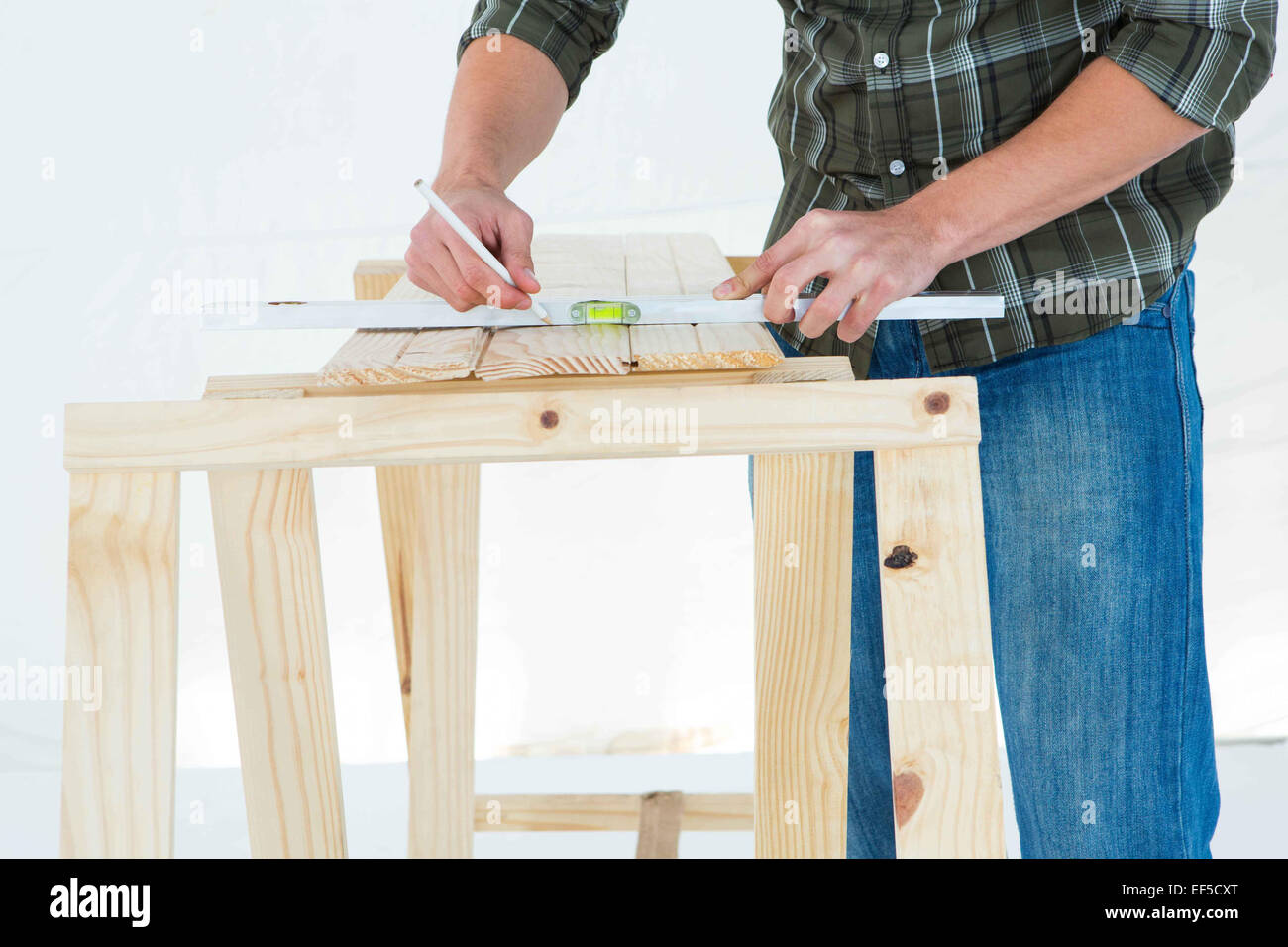 Construction using spirit level on hi-res stock photography and images ...