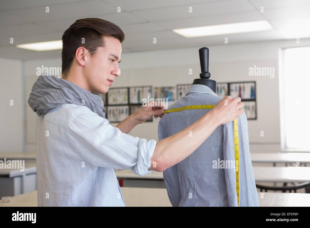 Fashion student working on mannequin Stock Photo Alamy