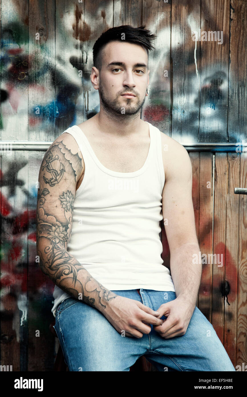 Tattoo arm man hi-res stock photography and images - Alamy