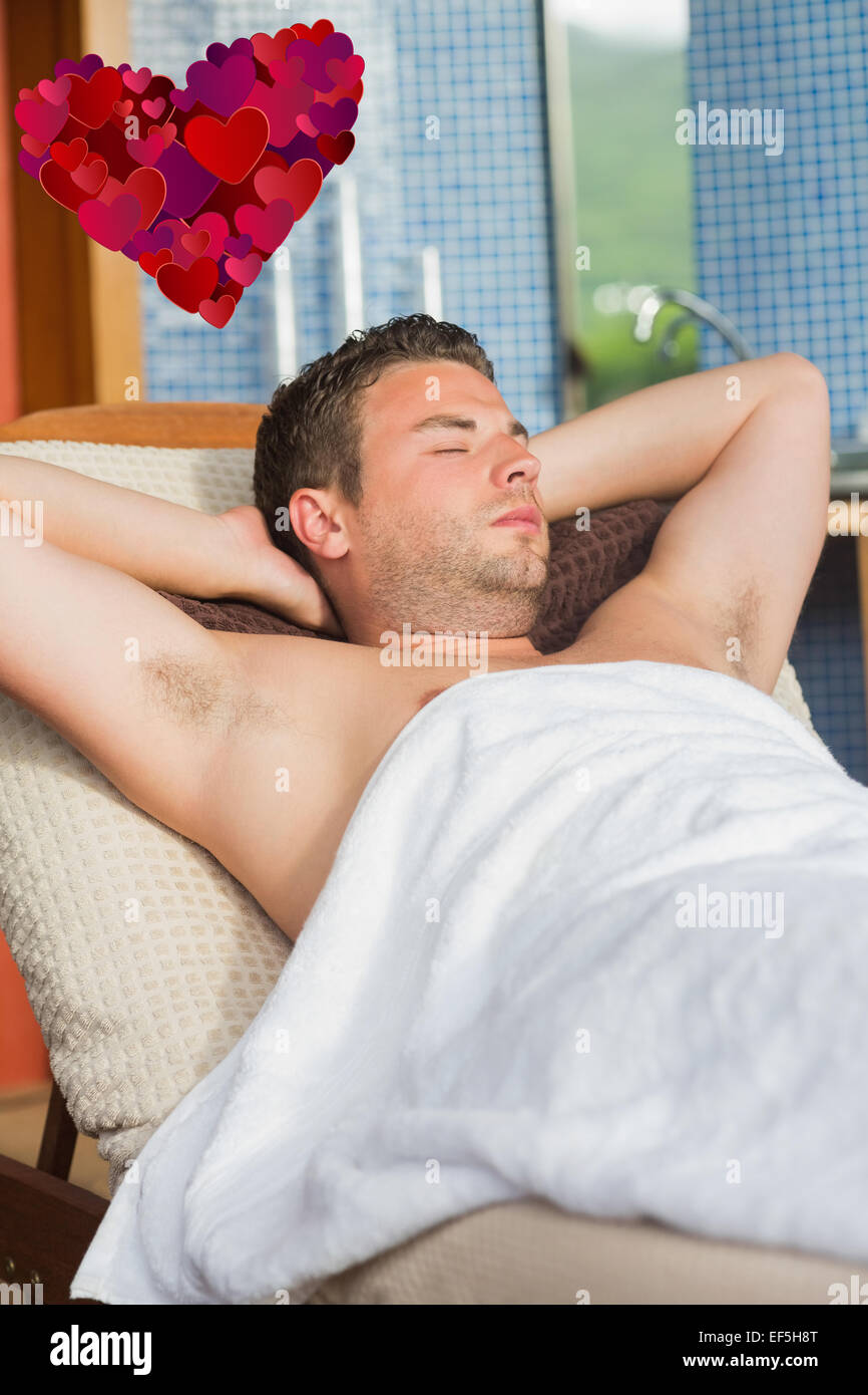 Composite image of man relaxing at the spa Stock Photo