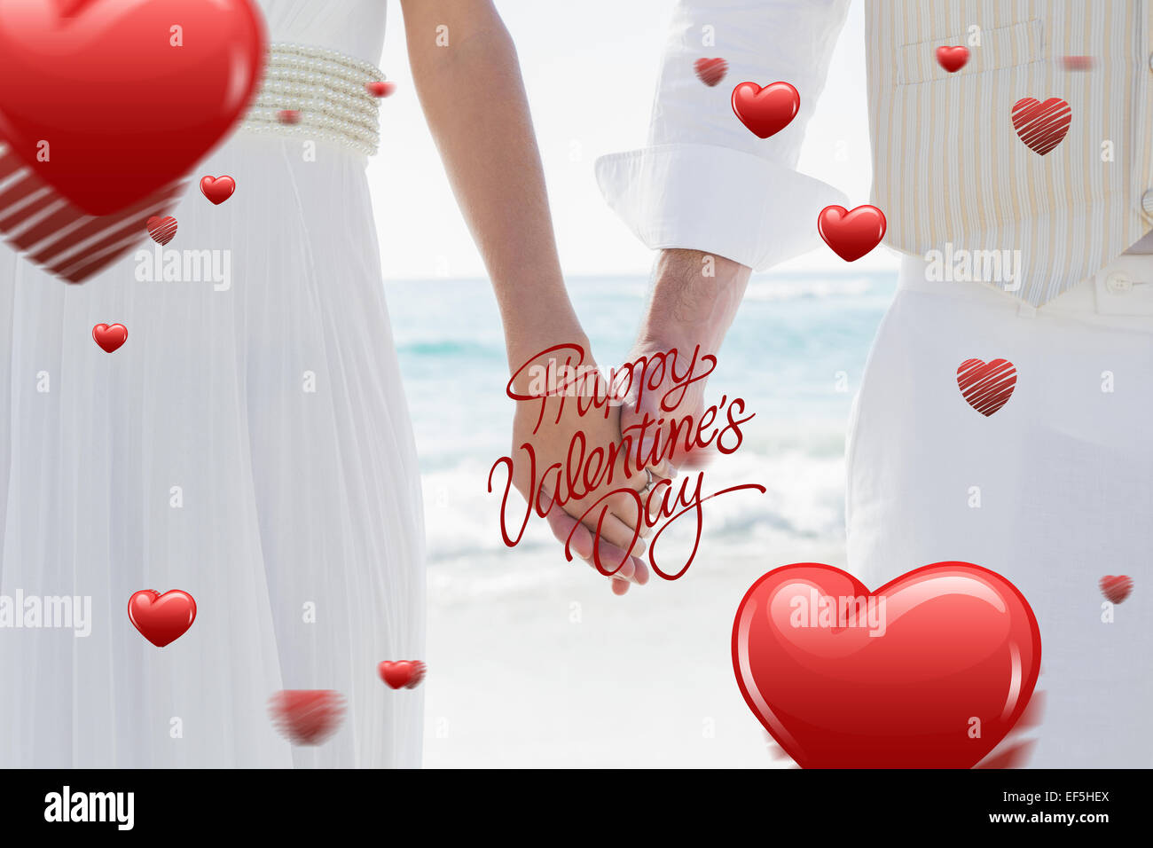 Composite image of newlyweds holding hands Stock Photo - Alamy