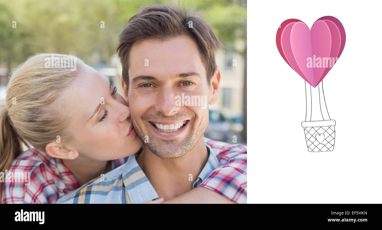 Composite image of young hip woman giving boyfriend kiss on the cheek Stock Photo