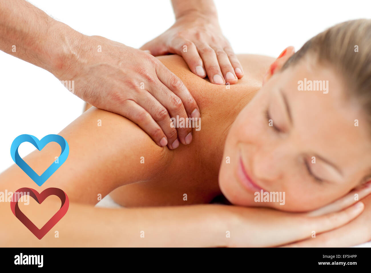 Composite image of serene woman enjoying a massage Stock Photo
