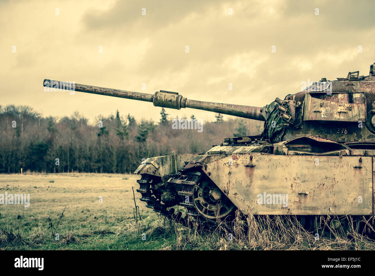 Old tank in autumn nature Stock Photo