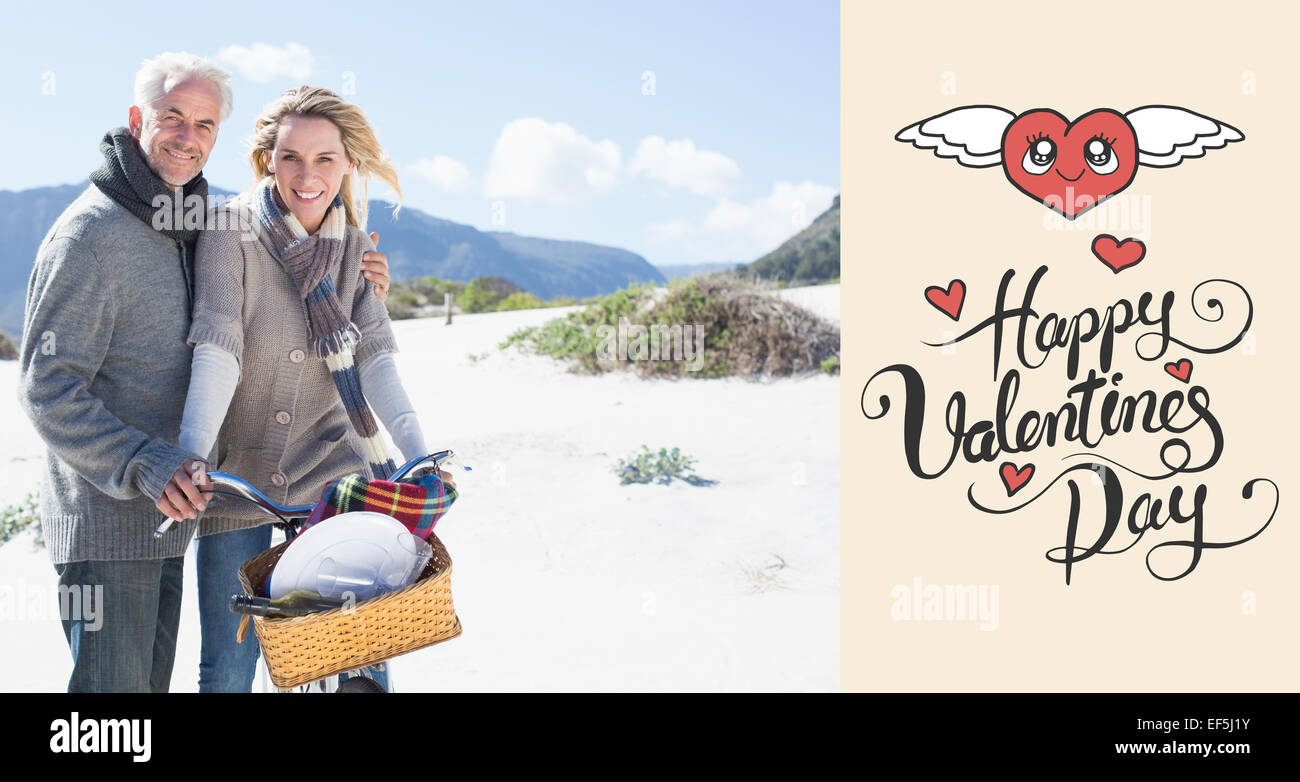 Composite image of carefree couple going on a bike ride and picnic on the beach Stock Photo