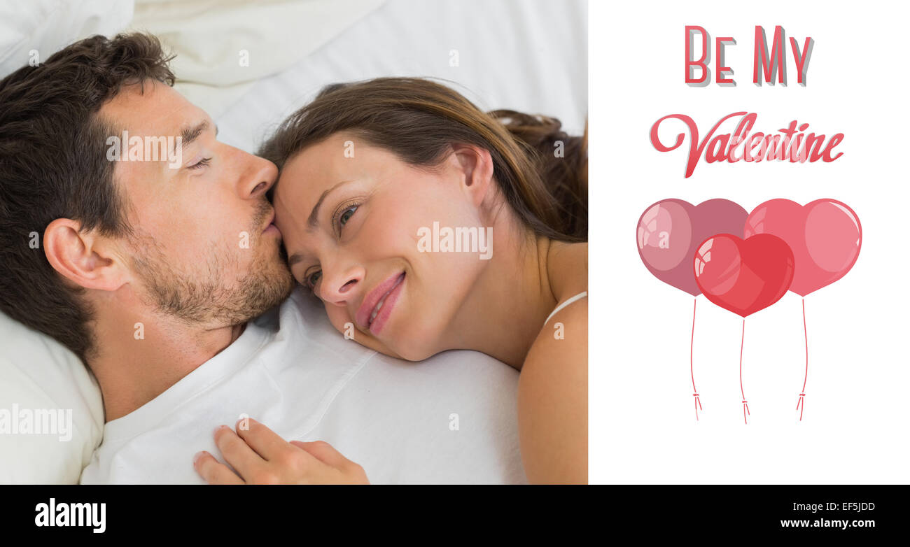 Composite image of relaxed couple sleeping together in bed Stock Photo