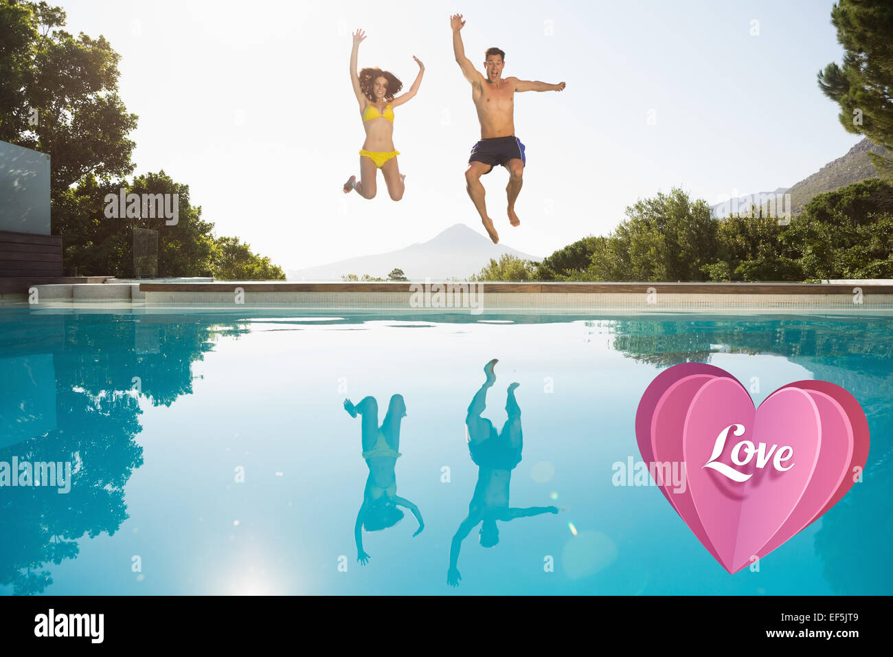 Composite image of cheerful couple jumping into swimming pool Stock Photo