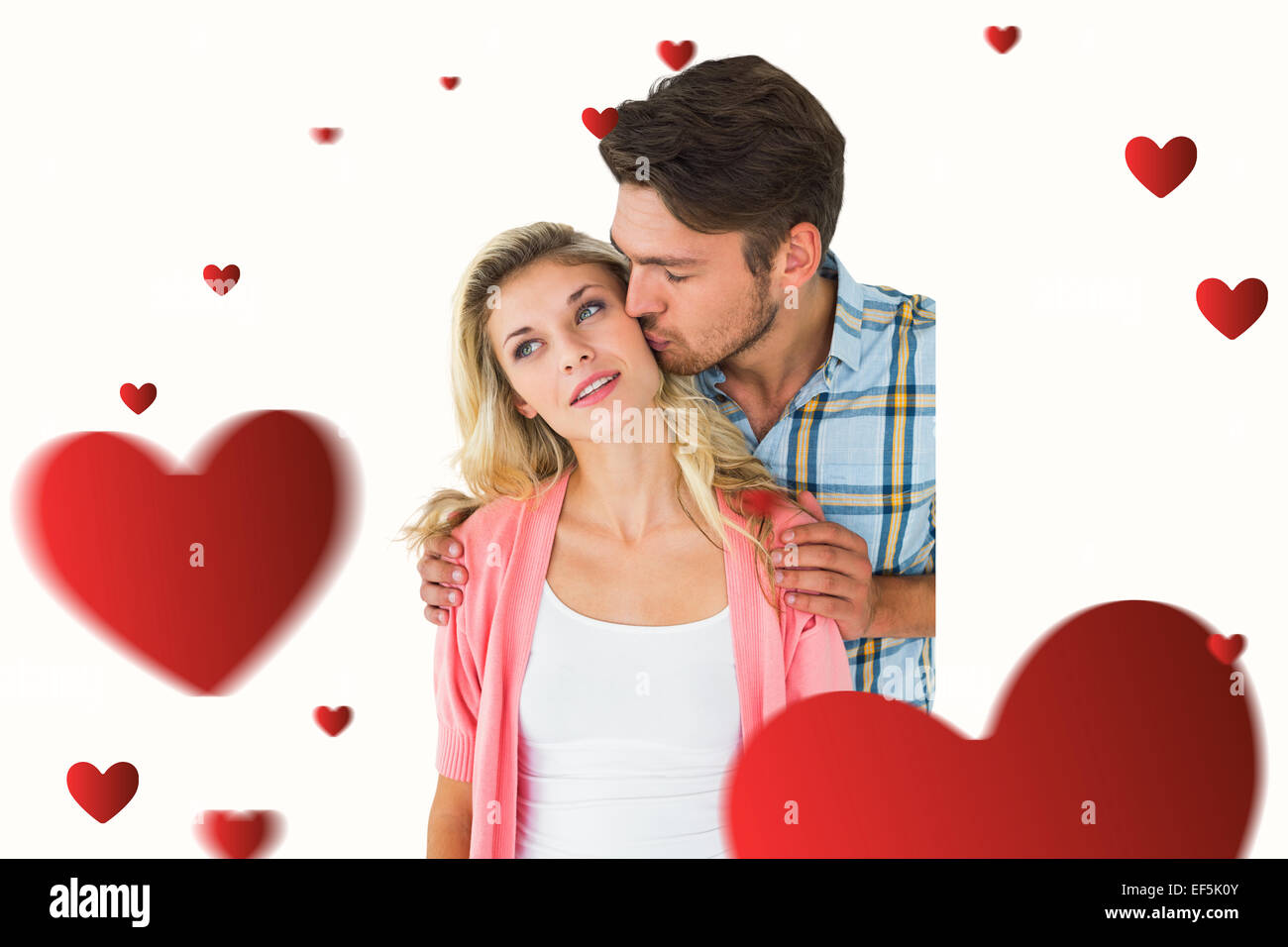 Composite image of attractive young couple smiling together Stock Photo ...
