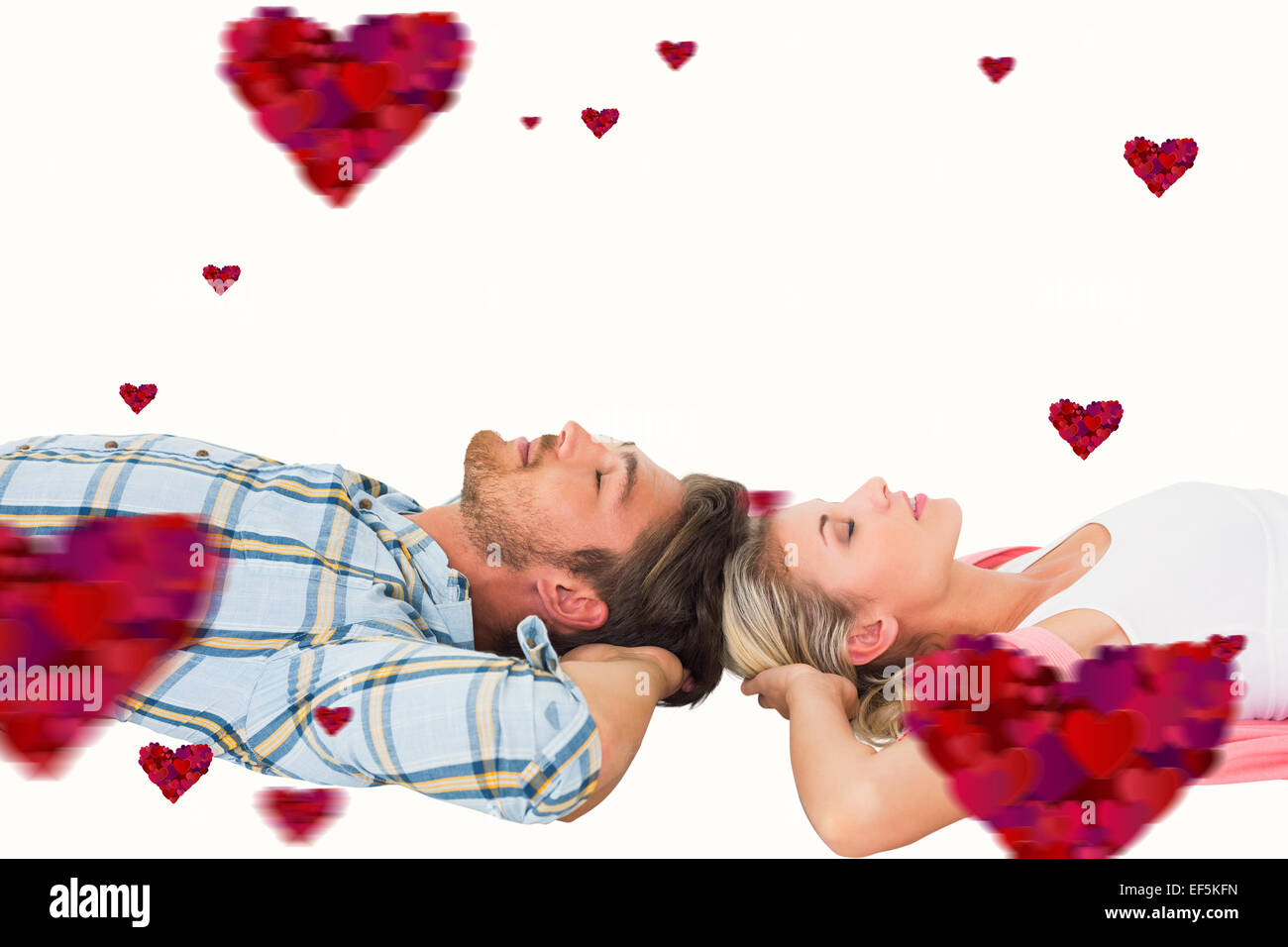 Composite image of attractive young couple sleeping peacefully Stock Photo