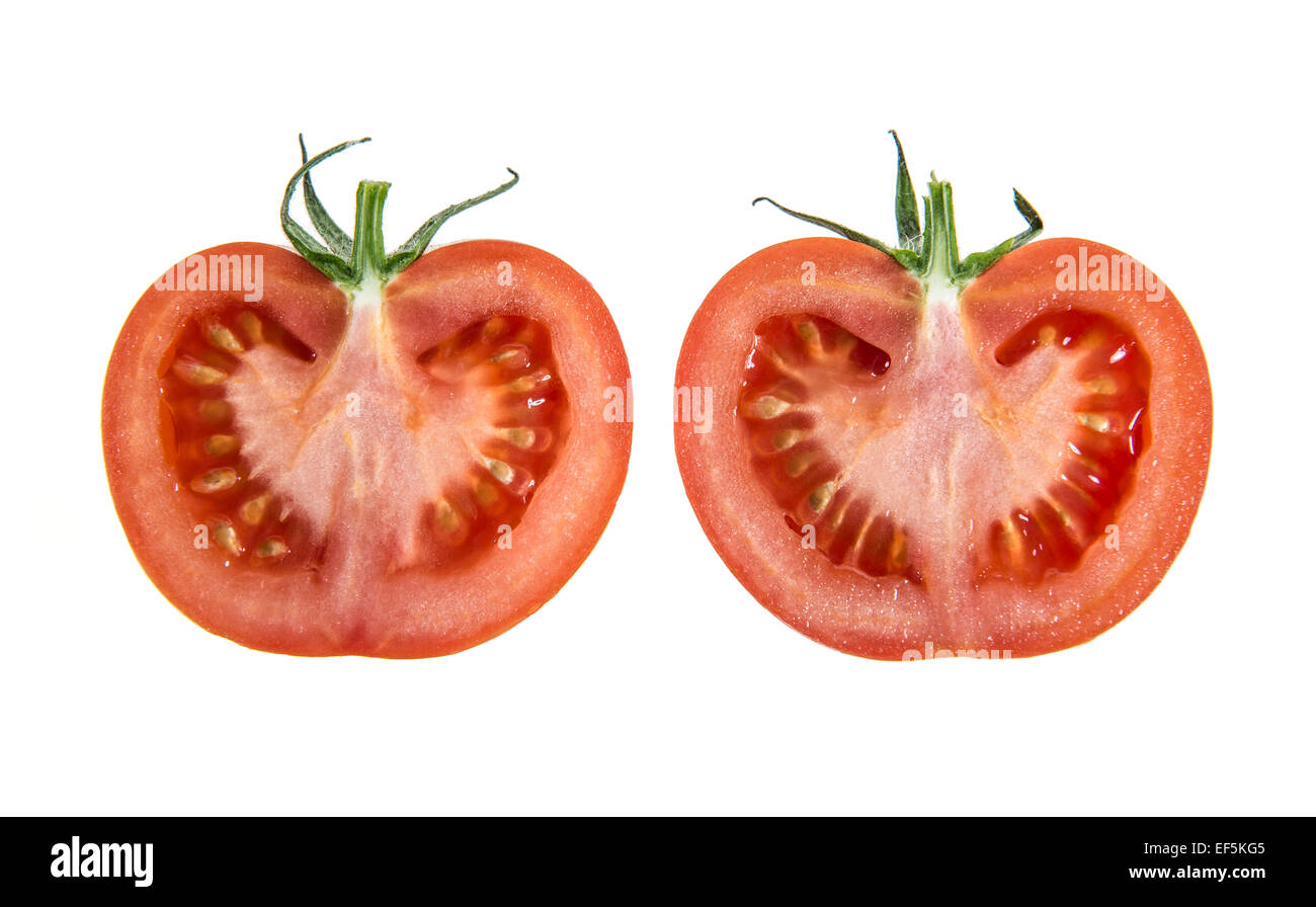 Two halves of fresh tomato, cutout Stock Photo