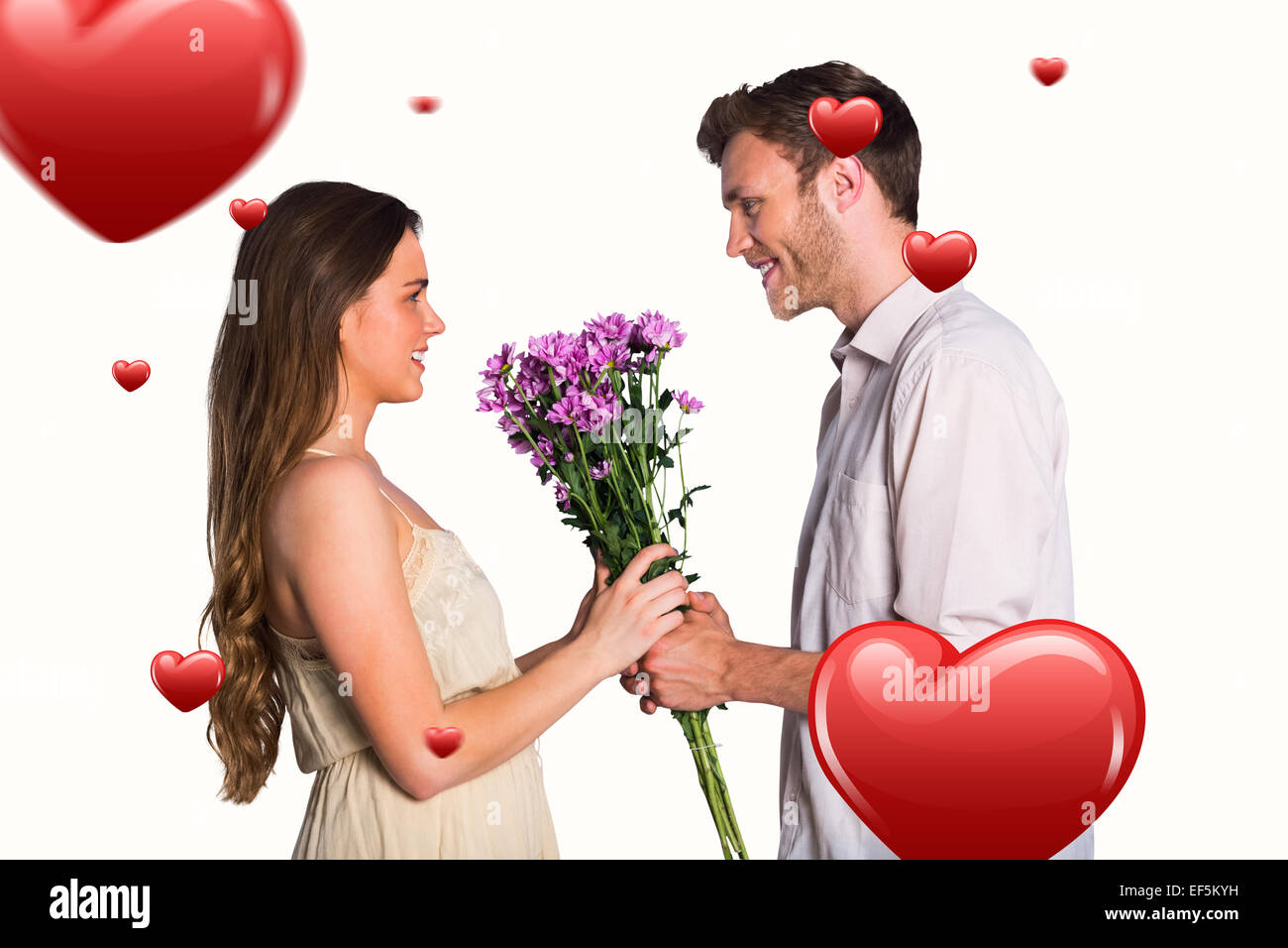Composite image of side view of couple holding flowers Stock Photo