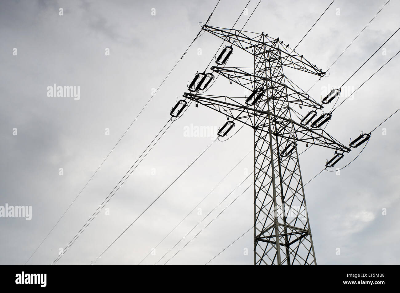 Electric power transmission or power grid pylon wires Stock Photo