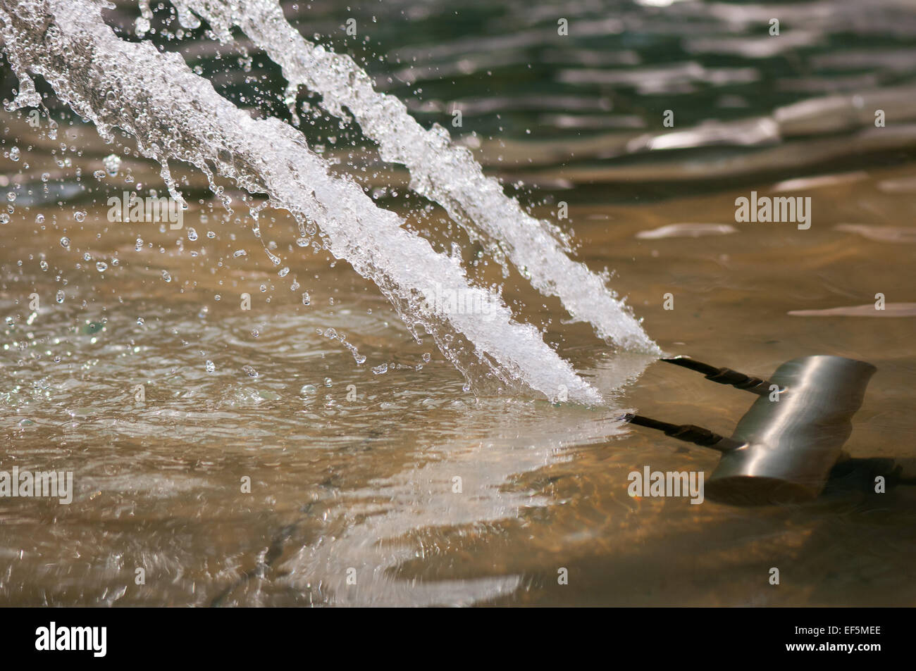 Fountain water gush nozzle device detail Stock Photo