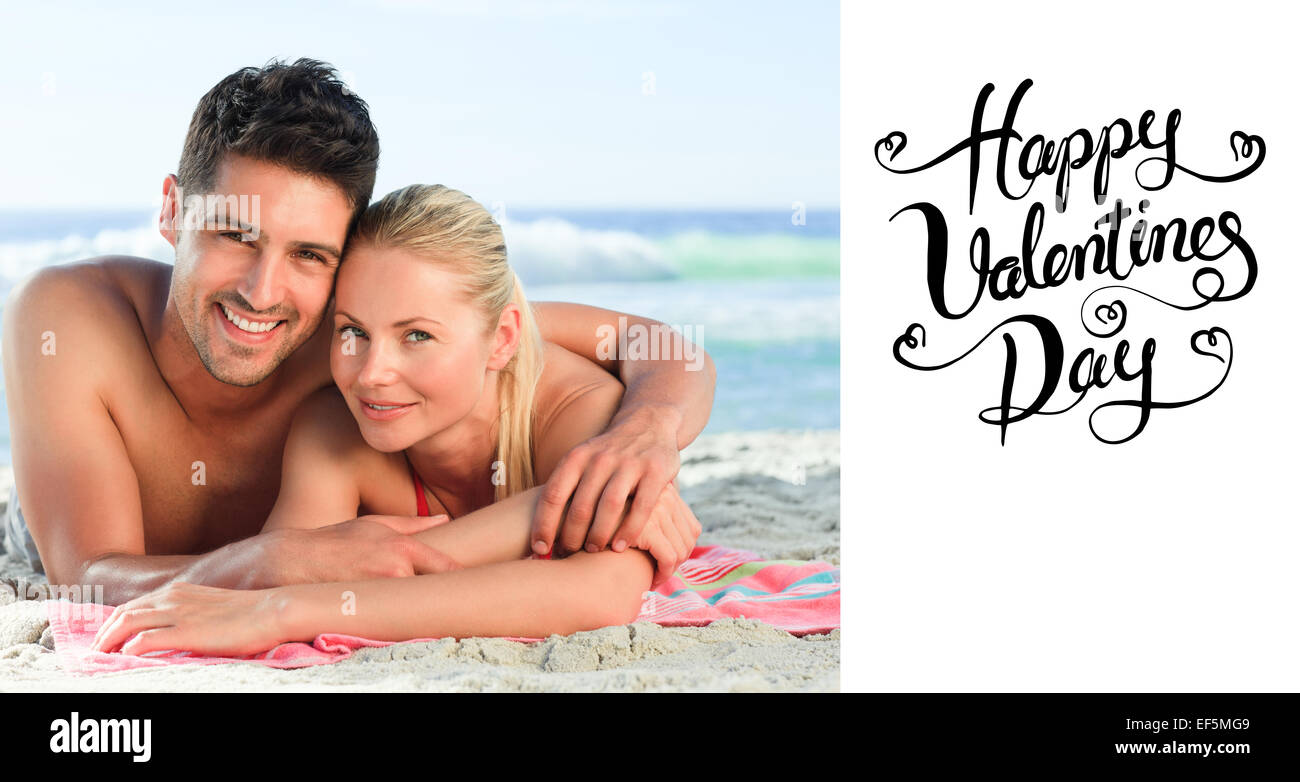 Composite image of cute valentines couple Stock Photo