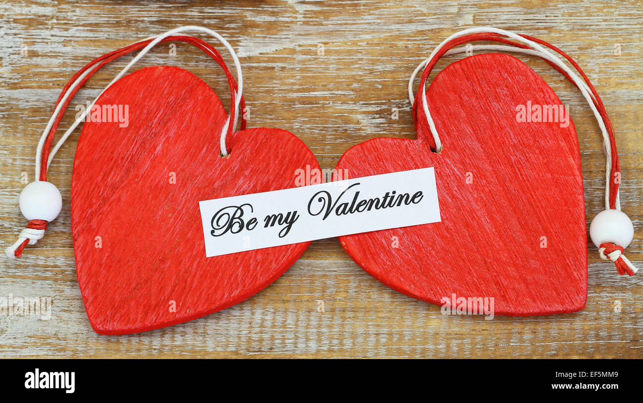 Be my Valentine card with two red hearts Stock Photo